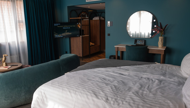 Executive#342 Zimmeransicht_Bett_Sitzecke